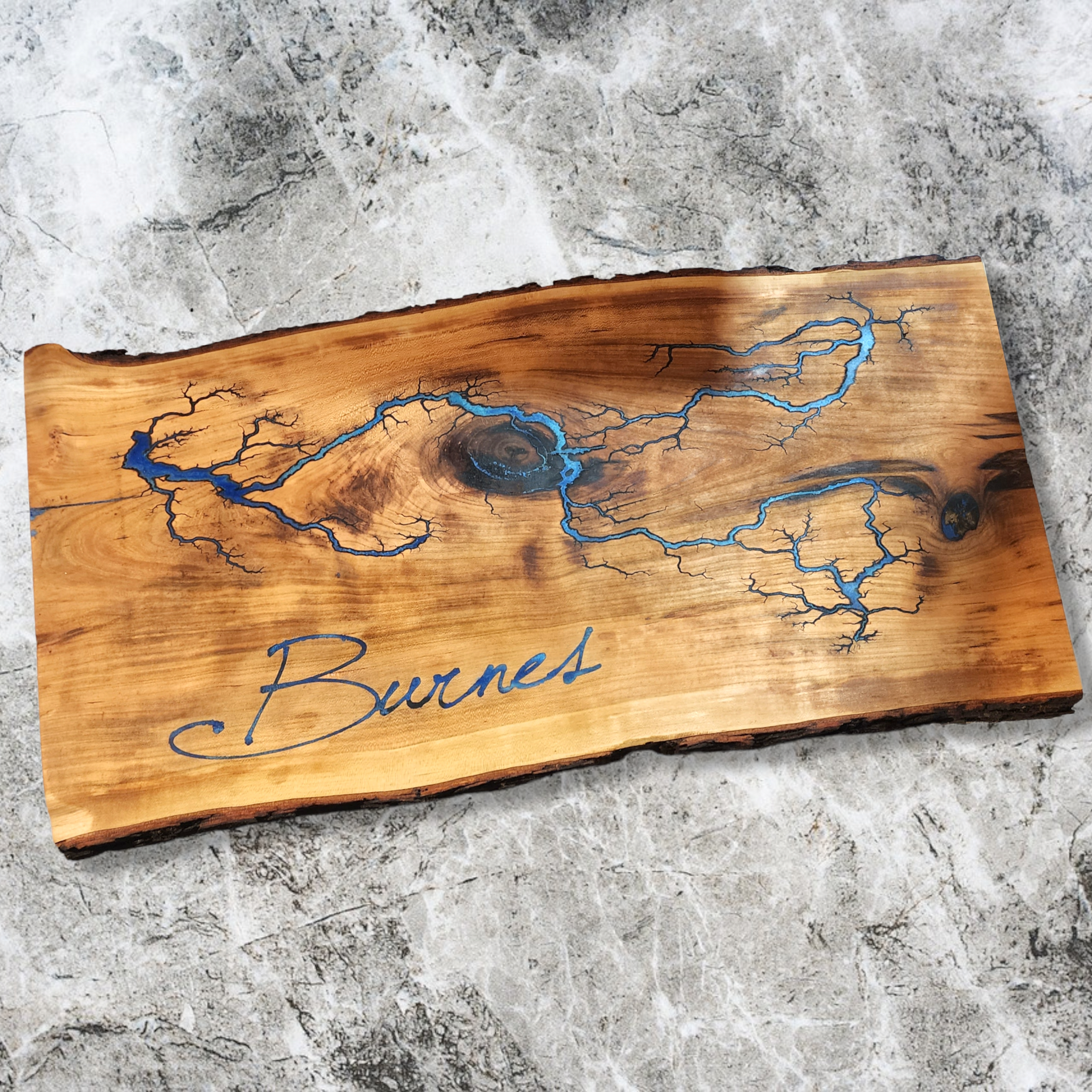Handcrafted live edge charcuterie board engraved, featuring exotic hardwoods. Made by a veteran-owned small business