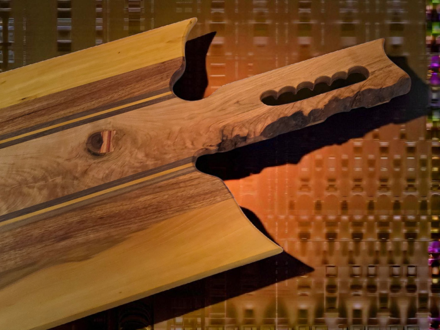 Handmade charcuterie board with a live-edge handle.