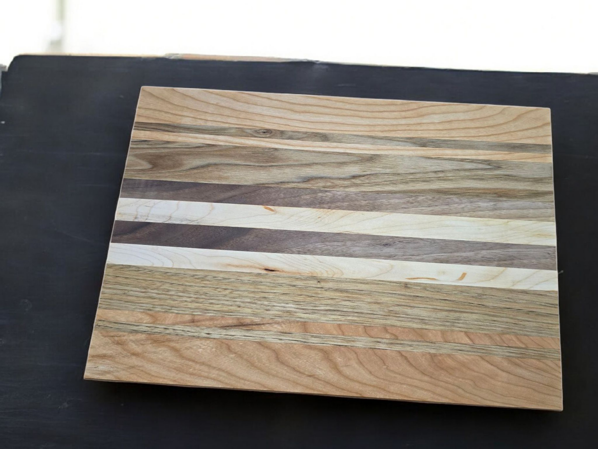 Veteran-owned brand luxury end grain cutting board handcrafted from various hardwoods