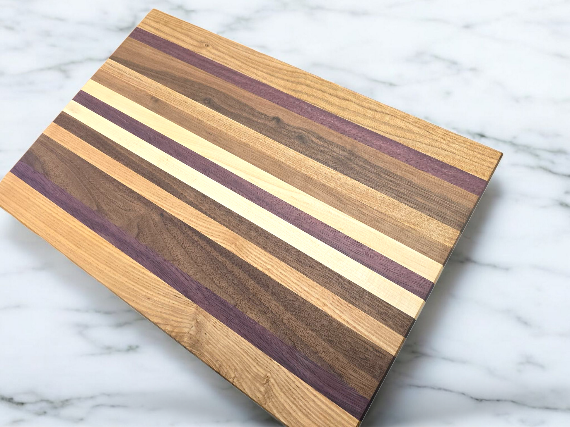 Veteran-owned brand luxury end grain cutting board handcrafted from various hardwoods