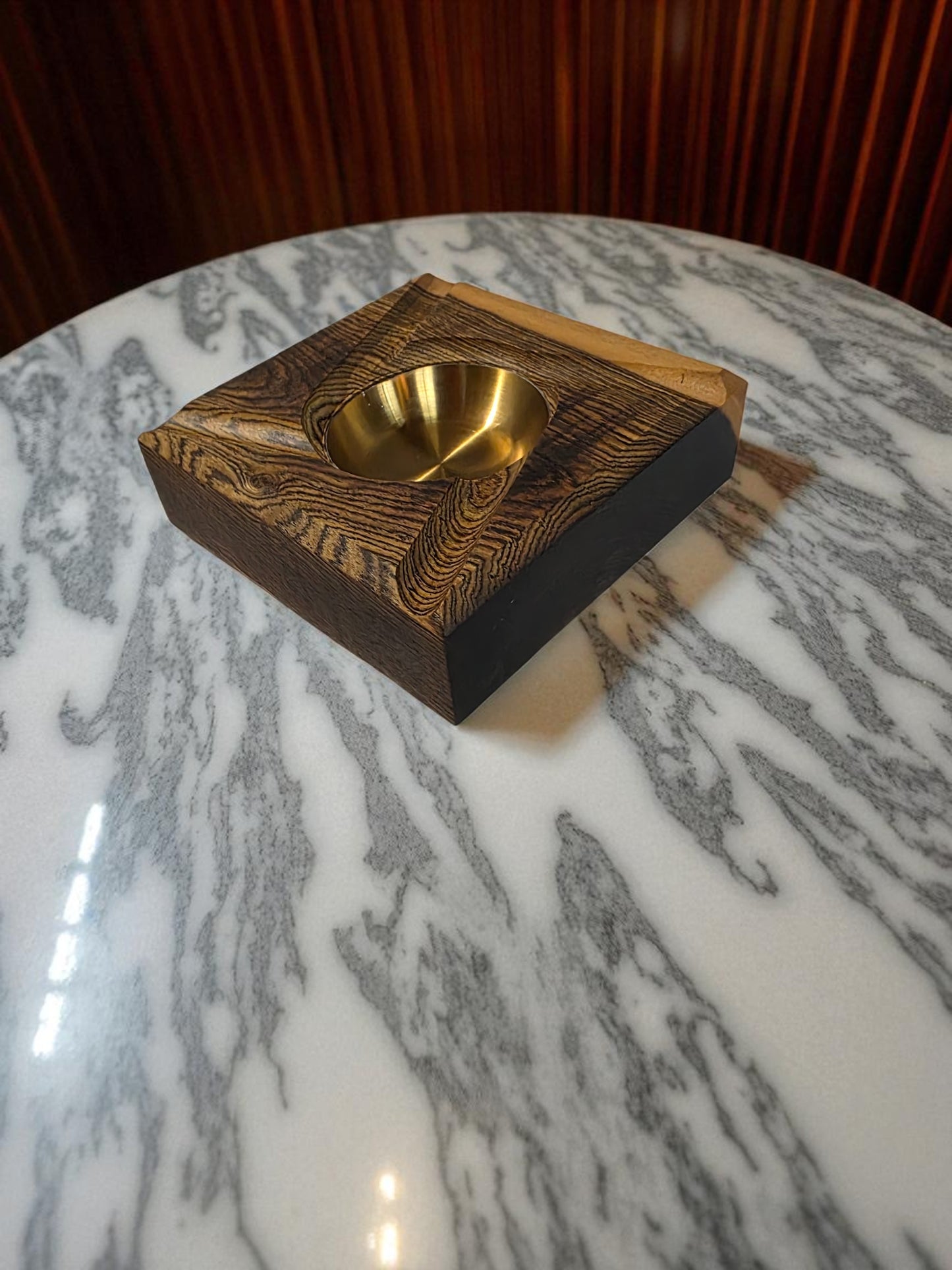 Wooden ashtray with a Brass interior.