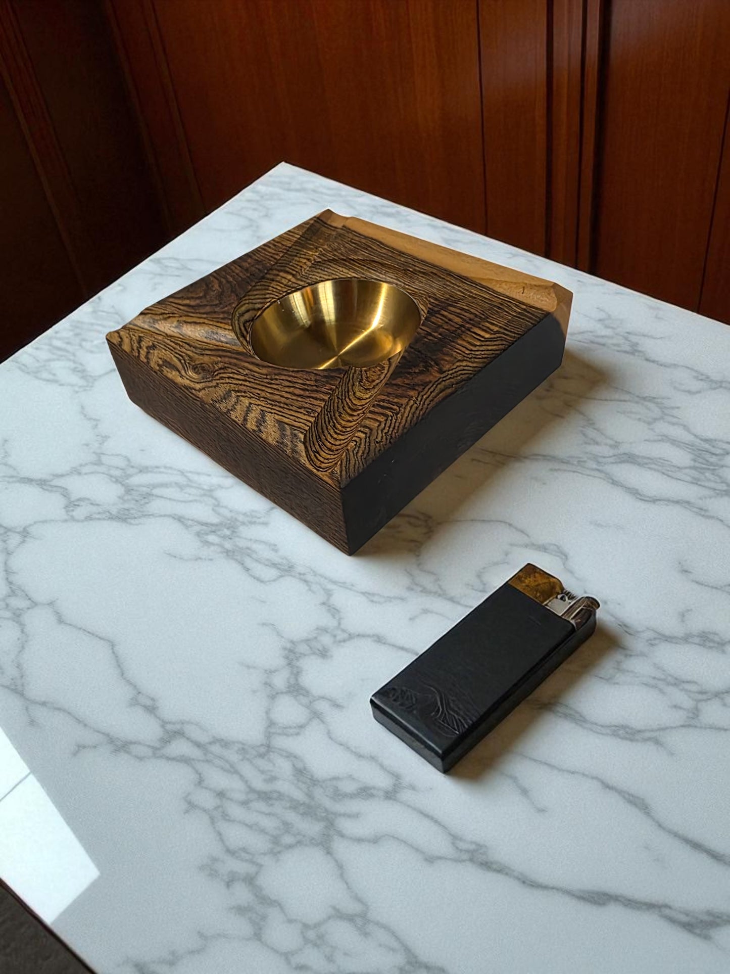 Wooden ashtray with a Brass interior.