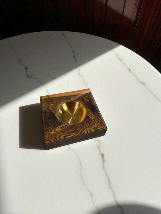 Wooden ashtray with a Brass interior.